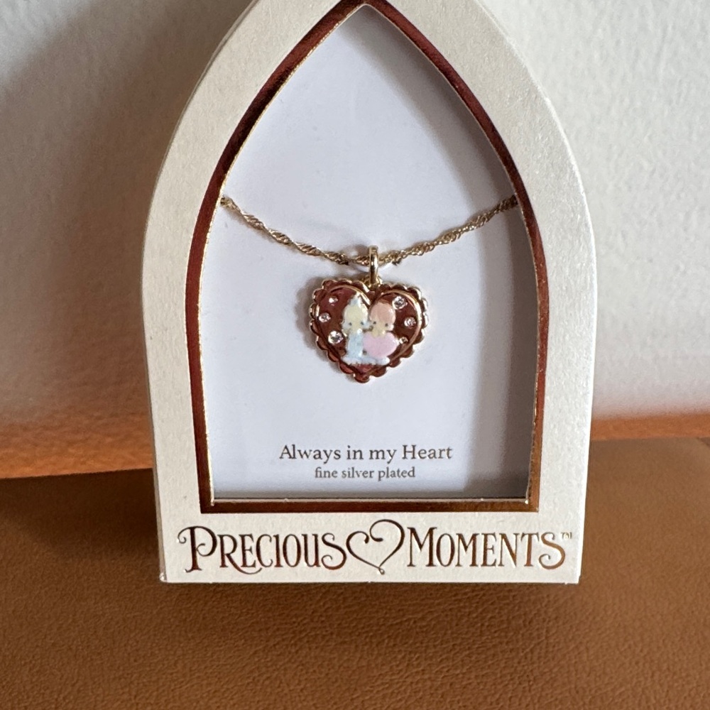 Precious moments necklace.